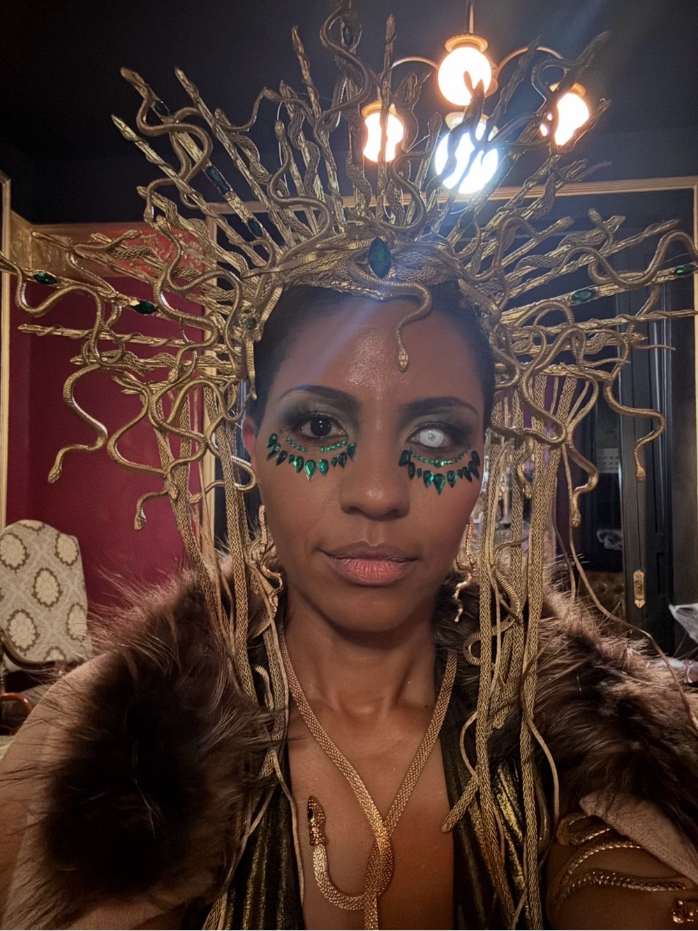 Gold Medusa-Inspired Decorative Headpiece with Emerald Accents